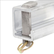 Pair of heavy-duty ramp stand brackets made from high-strength, lightweight aluminum; each bracket weighs 26 lbs and features a lockable pin system (lock not included) for secure storage under flatbed trailers